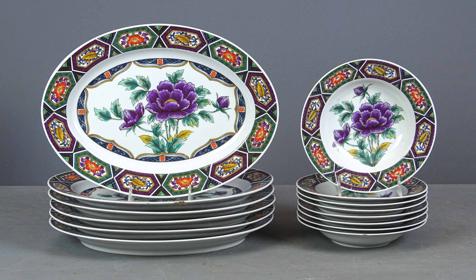 Georges Briard China: Georges Briard Amethyst Kutani china including: (8) 8 1/4" soups, (6) platters (14 1/2" x 10 3/4").