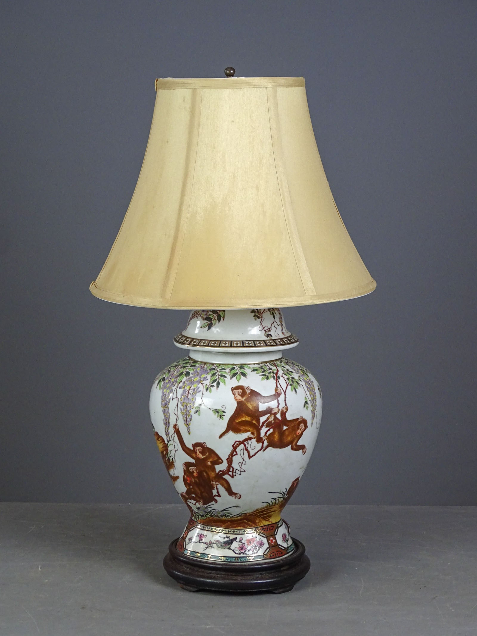 Japanese Satsuma Table Lamp: Japanese Satsuma style porcelain ginger jar table lamp featuring monkeys and Wisteria. 25" Ht..