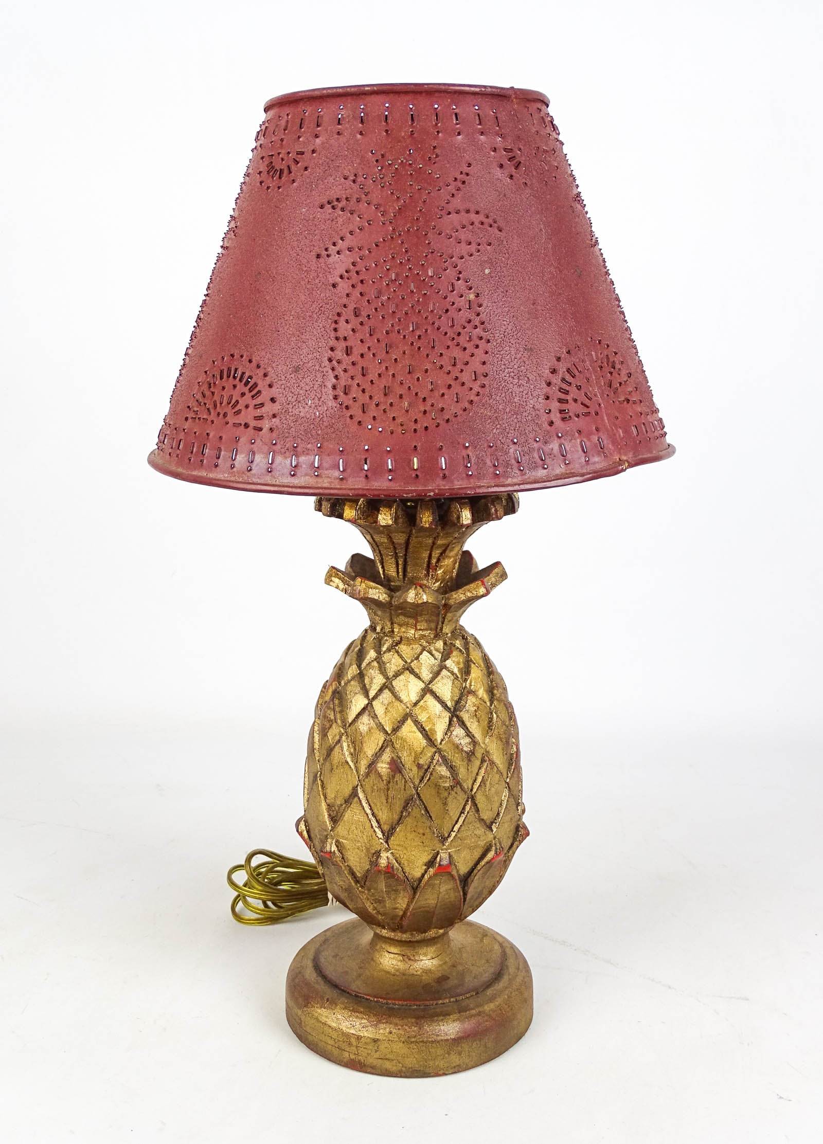 Table Lamp: Table lamp with faux gilt pineapple base and pierced tin shade. 18" Ht..