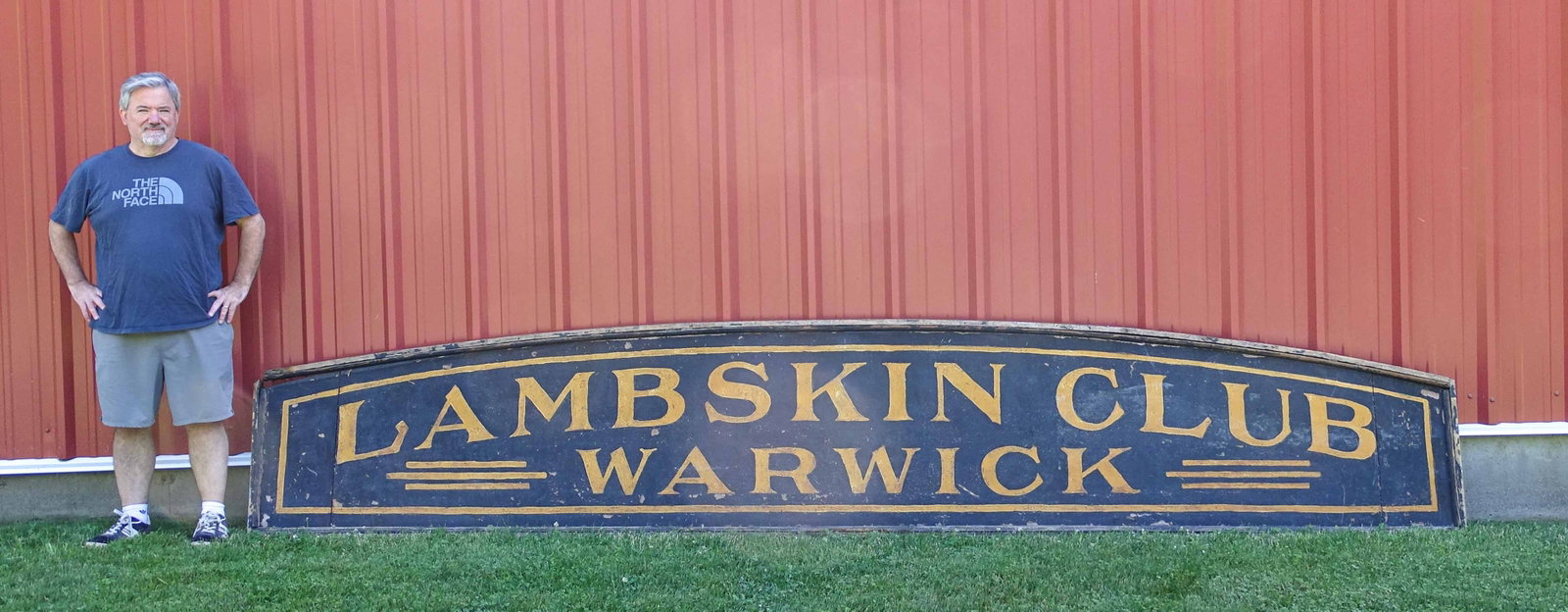 Trade Sign: Monumental wooden sign "LAMBSKIN CLUB WARWICK". 13' 11" L., 30" Ht..
