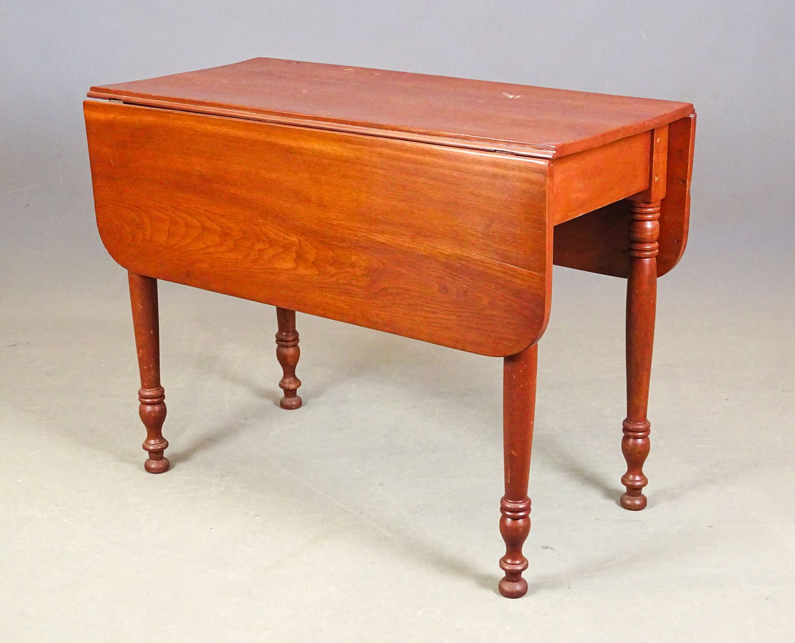 19th c. Dropleaf Table: 19th c. turned leg dropleaf table. 36" x 17" with 12" leaves, 28" Ht..