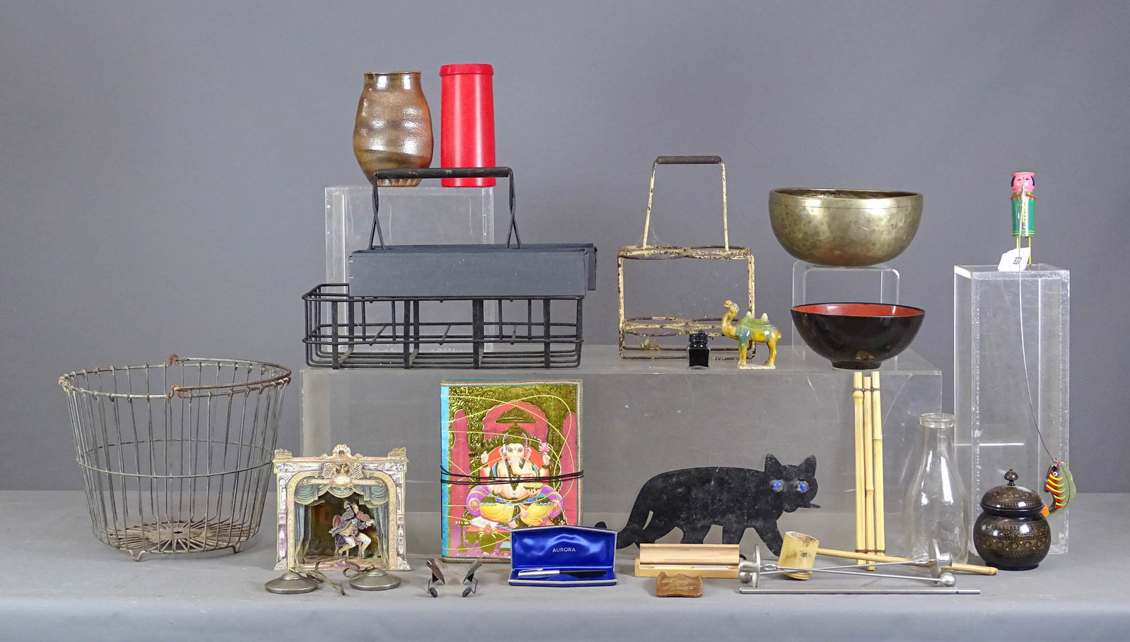 Misc. Lot: Misc. lot including: Two metal carriers (largest 18" x 9" x 13"), brass bowl (10" D., 5" Ht.), Asian bowl (8" D., 3 1/2" Ht.), pair "balance" candlesticks, Asian covered dish (6 1/2" Ht.), Asian portf