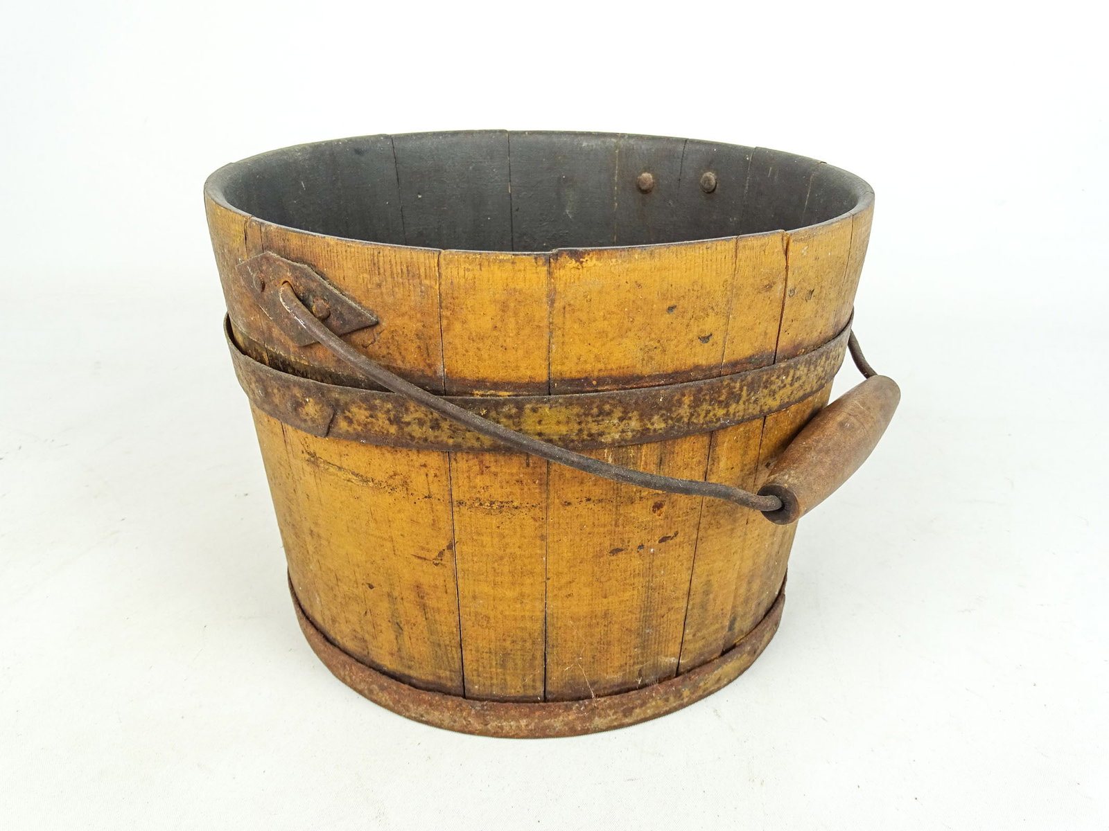 19th c. Shaker Bucket: 19th c. Shaker swing handle bucket in old yellow paint. 9" D., 7" Ht..