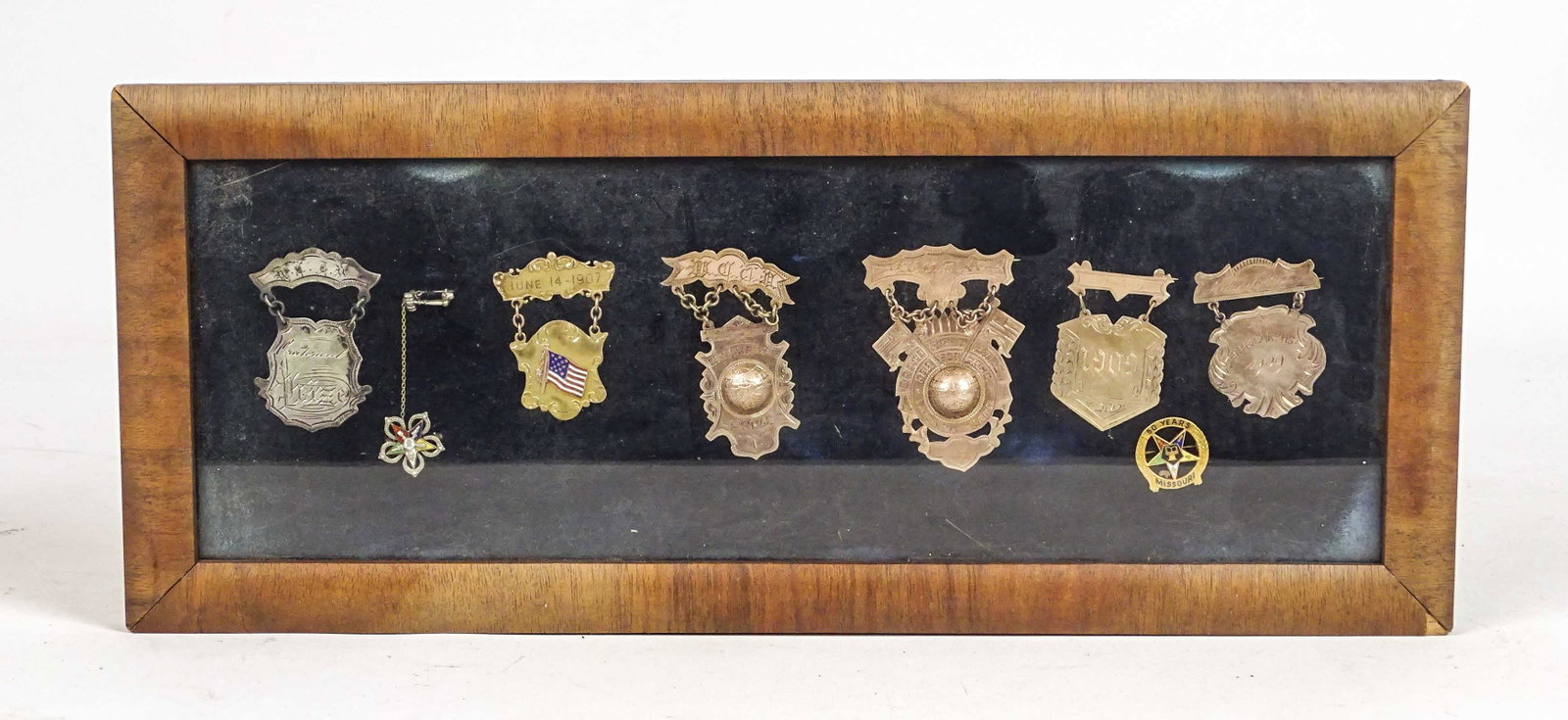 Lot of Framed Medals: Lot of framed gold medals. Some dated 1909. Frame overall 5 1/2" x 12 1/2".