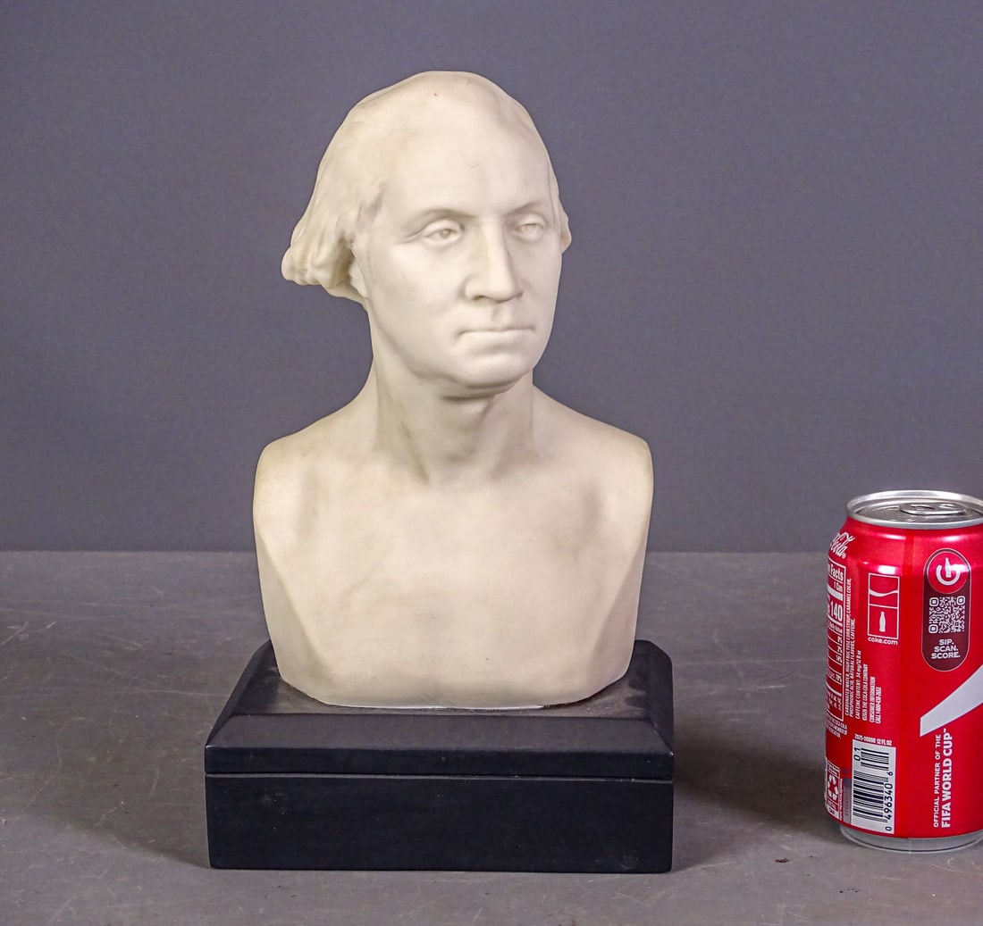 Parian Statue of George Washington: Parian statue of George Washington. Overall on base 7" x 5" x 11". Labeled underside. Design Master Associates, Williamsburg, VA. 1998.