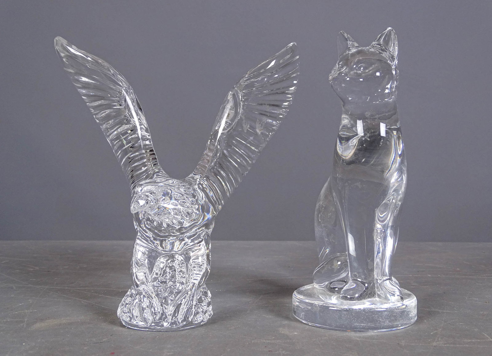 Waterford and Hoya Glass Paperweights: Lot (2) glass paperweights. Cat marked Hoya (7" Ht.), eagle marked Waterford (6 1/2" Ht.).