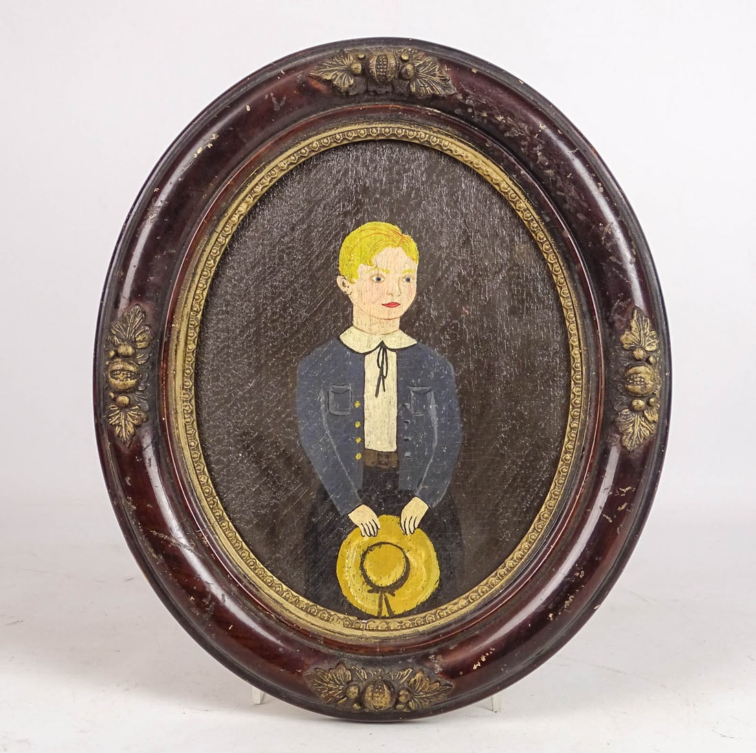 Primitive Painting of a Child: Primitive painting of a child. Oil on wooden panel. Overall in frame 14" x 11".