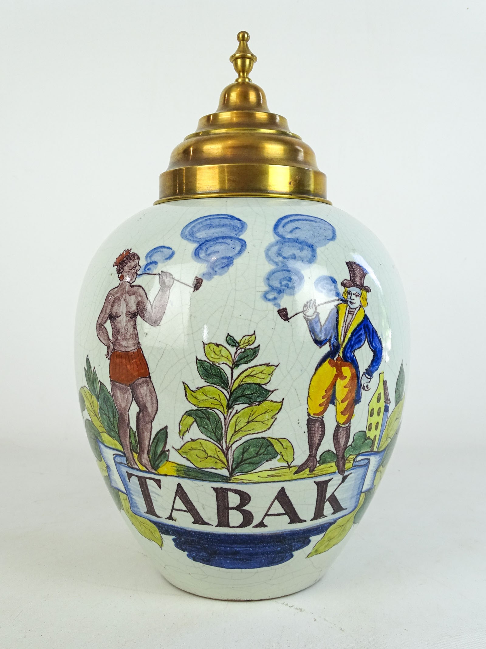 Delft Ceramic Tobacco Jar: Delft polychrome ceramic jar "TABAK". Brass lid. 9" D., 15" Ht..
