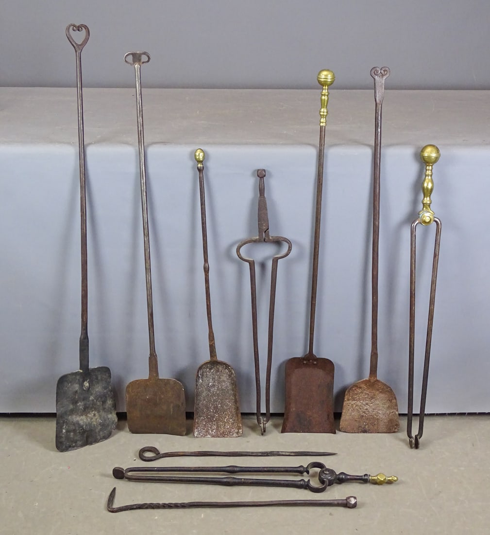Early Fire Tools: Lot (12) 18th and 19th c. iron and brass fire tools. Longest 38" L..