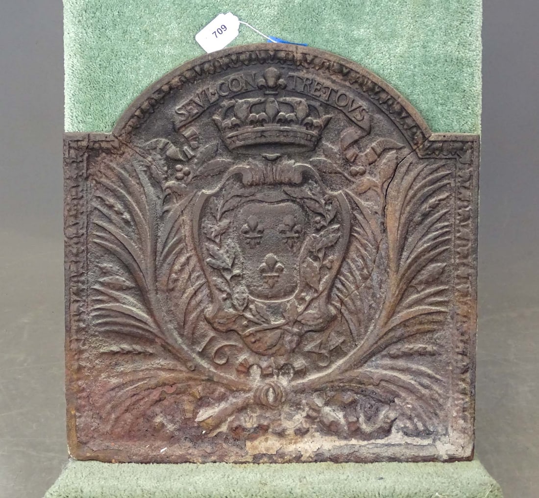 18th c. Cast Iron Fireback: 18th c. cast iron fireback. Marked. 25" x 26".