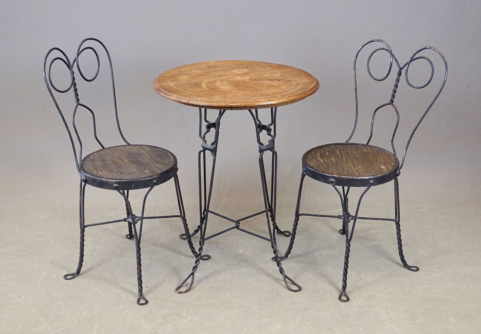 Café Set: Café set including round table and (2) chairs. Table 24" D., 30" overall Ht..