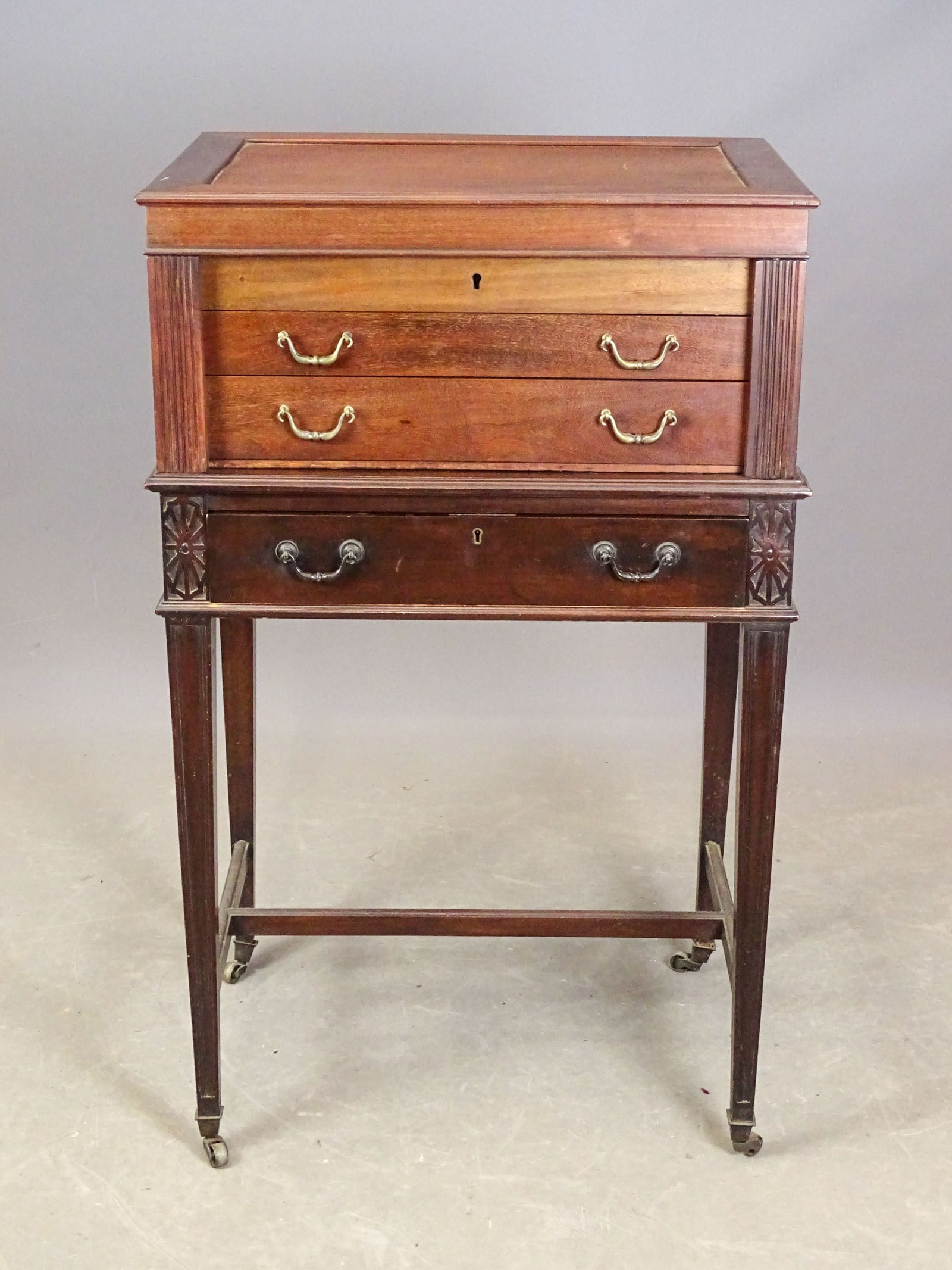 Silver Chest on Stand: Silver chest on stand. Married together. Overall 25" x 18" x 40 1/2" Ht..