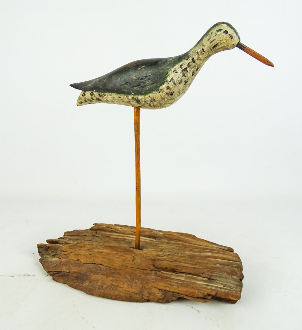 Shorebird: Carved shorebird on driftwood base. Bird 12" L, 16" overall Ht. on base.