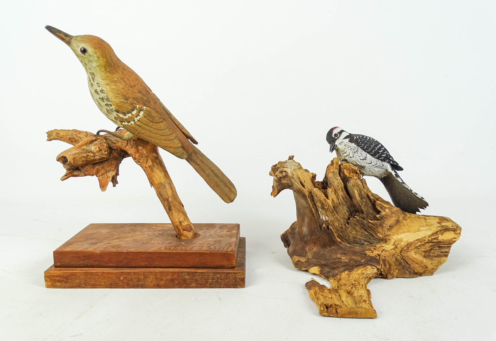 Bird Carvings: Lot (2) bird carvings including: "MISS SARA E. FINNEY…MILLEDGEVILLE GA" (11" Ht.), "Downy Woodpecker…Frankin W. (?) (7" Ht.).