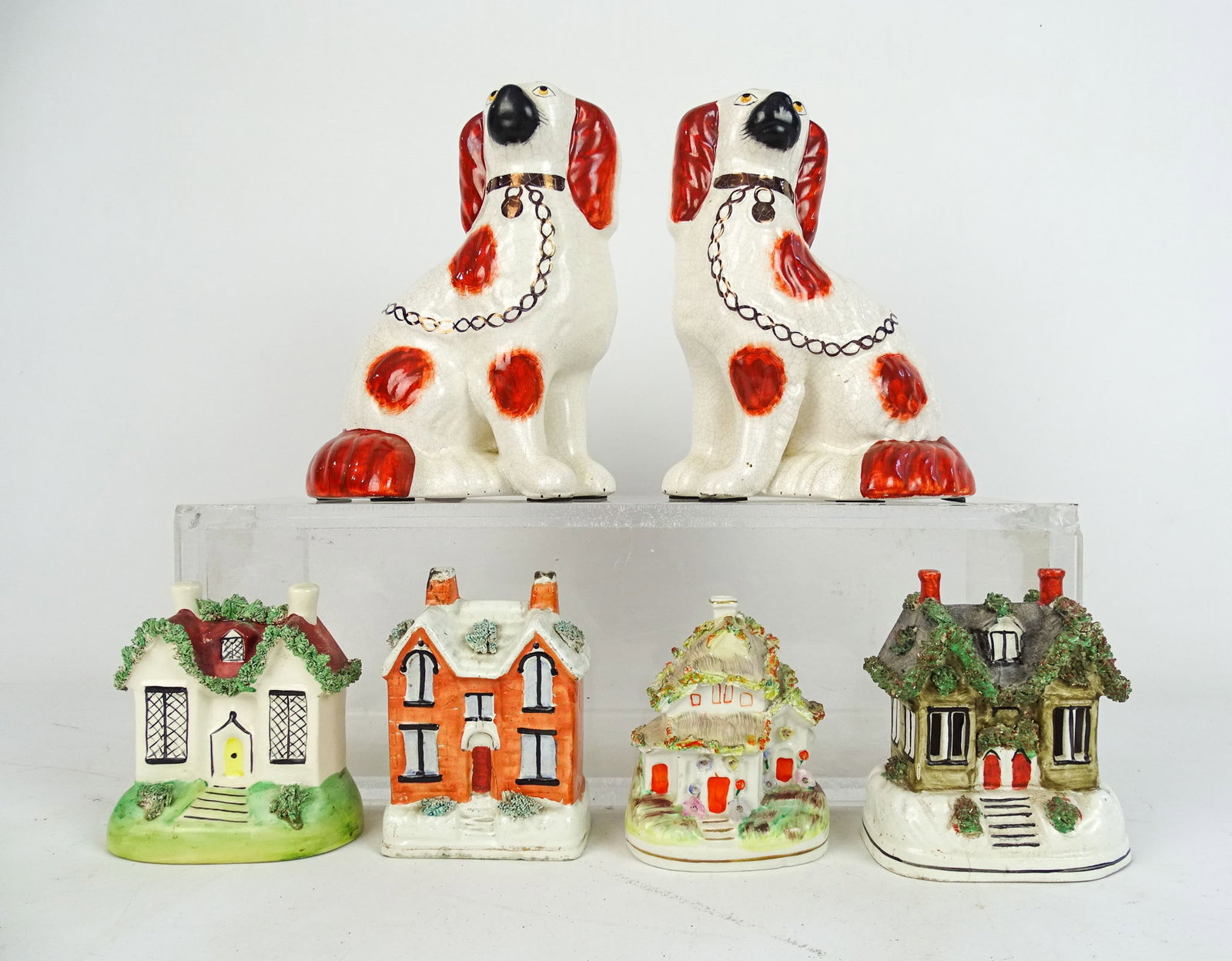 Staffordshire Lot: Lot including: Pair of Staffordshire Spaniels (9" Ht.), and (4) houses (largest 5 1/2" Ht.).
