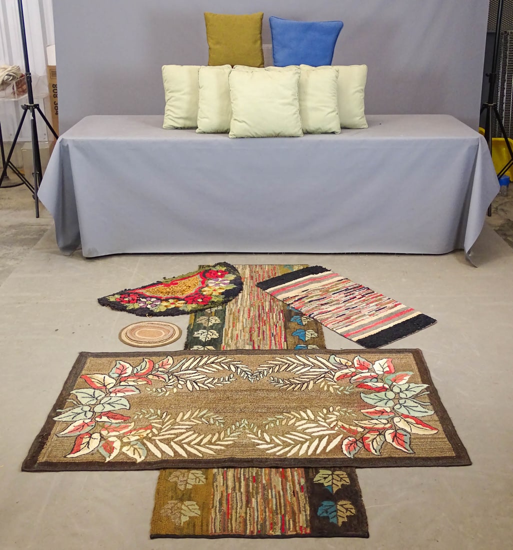 Hooked Rug & Pillow Lot: Lot including: Hooked runner (25 1/2" x 82"), mini mat (11 1/2" x 9 1/2"), assorted pillows, floral hooked rug (32" x 60"), hooked rug (18" x 36"), hearth rug (31" x 18").