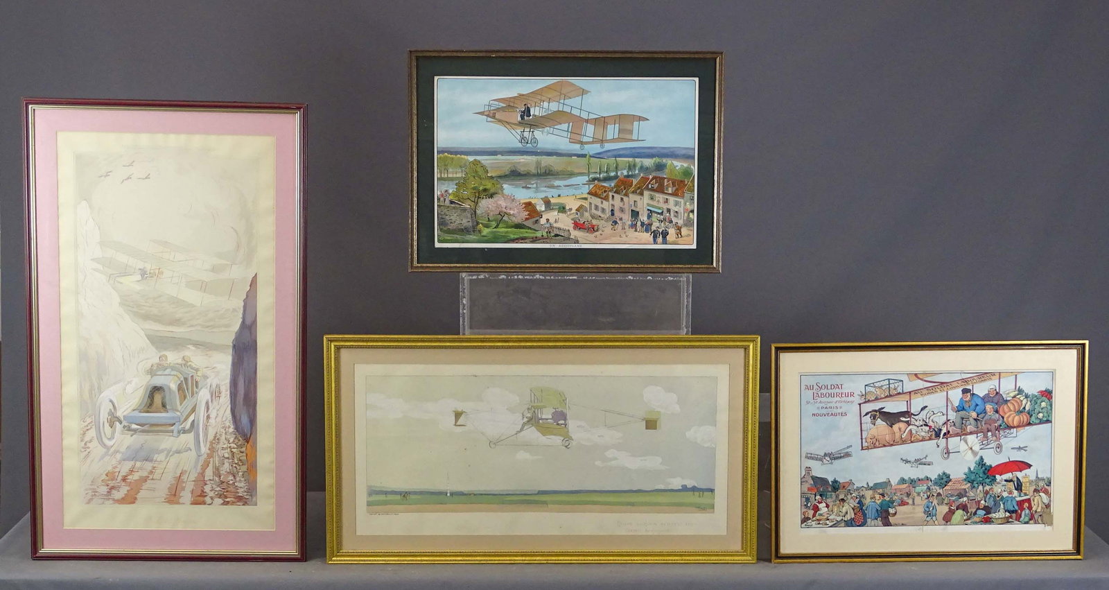 Framed Lot: Lot of framed artwork including: ariplane/auto "UN matek Moderne" (38" x 22 1/2"), print "UN AEROPLANE" (overall 18" x 25 1/2"), "AU SOLDAT LABOUREUR…" (overall 18 1/2" x 26"), "COUPE CORDON