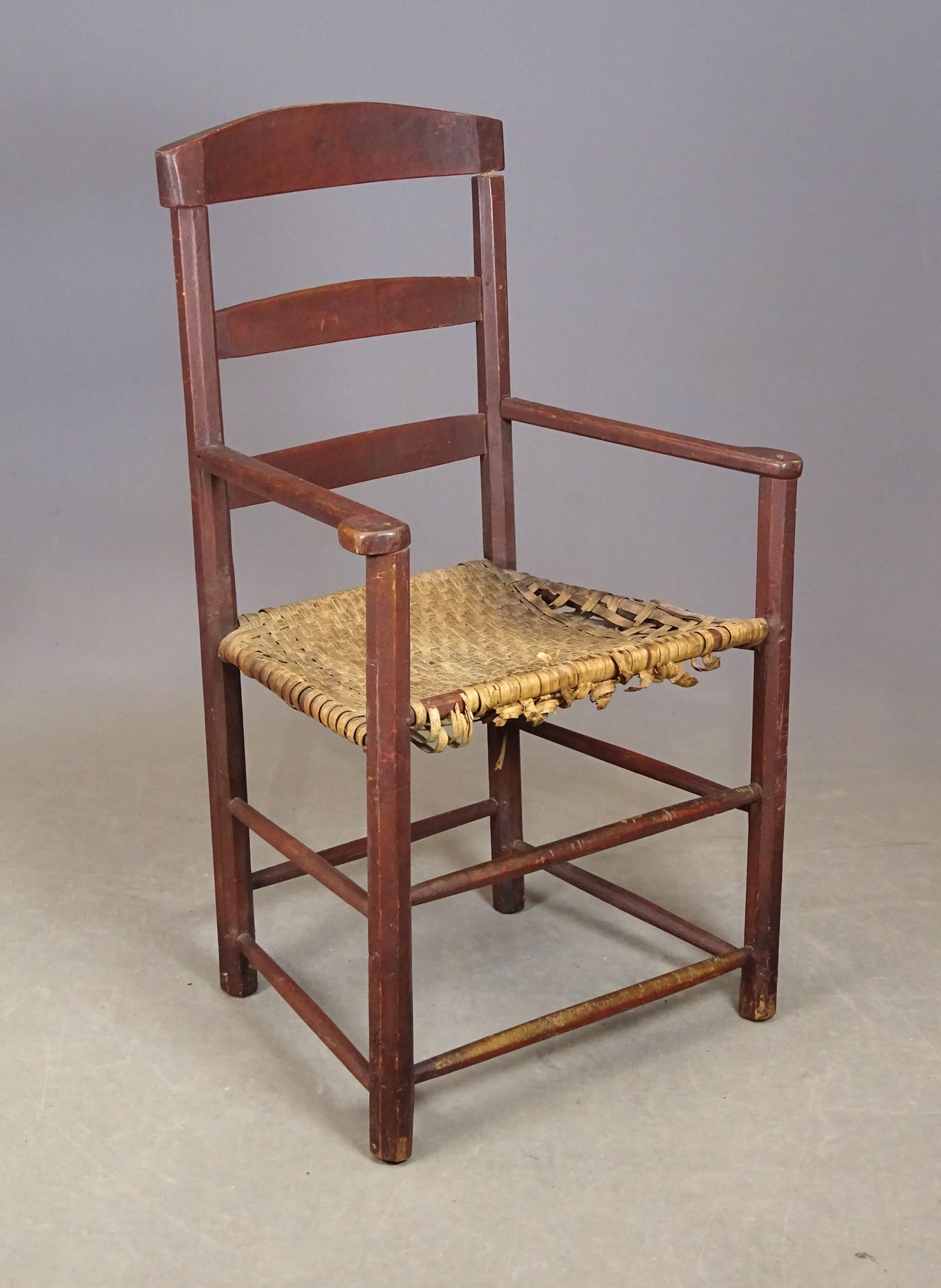 18th c. Chair: Early 18th c. primitive arm chair with splint seat. 20" seat ht., 38 3/4" ht. (as found)