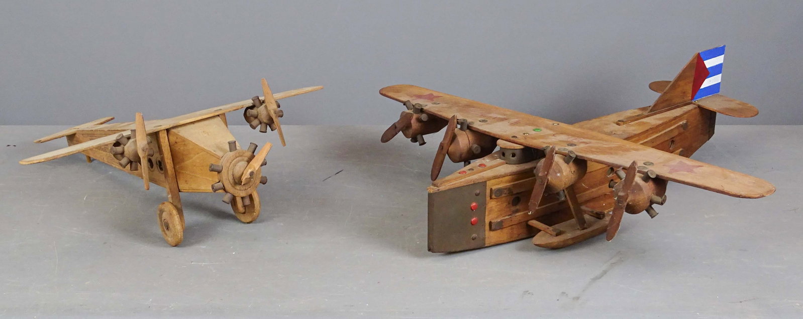 Wooden Airplanes: Lot (2) wooden airplane models. One marked Havana Cuba. 29 1/2" x 25" and 19" x 24".