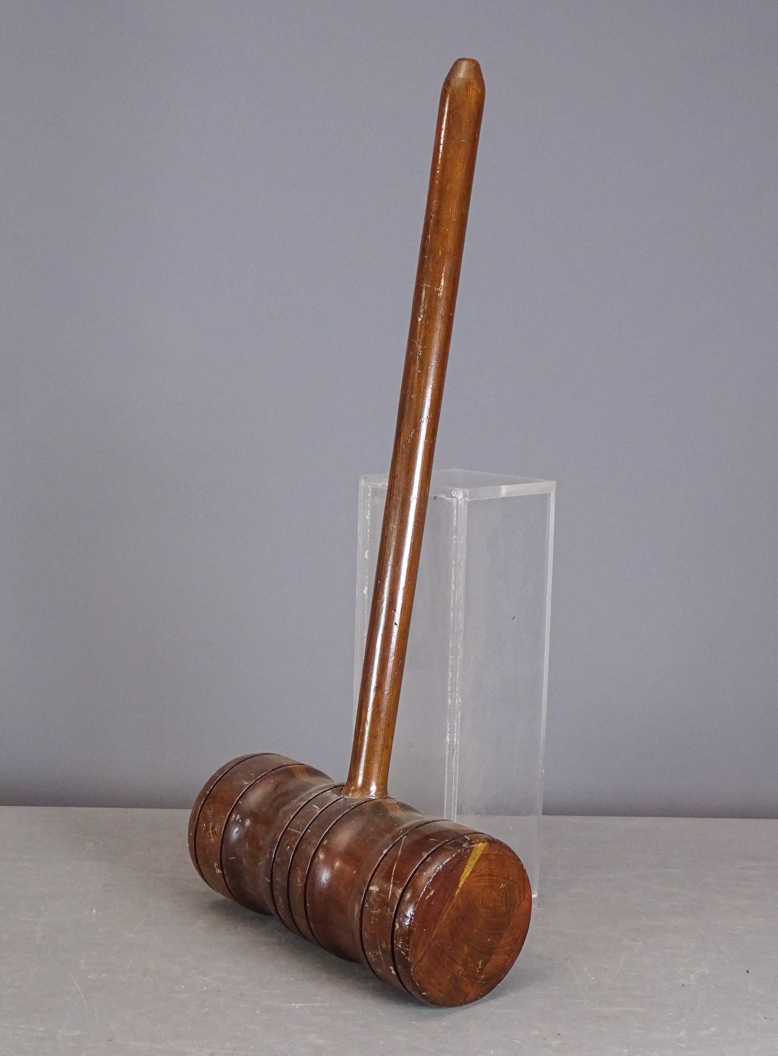 Large Gavel / Mallet: A large turned wood novelty gavel or mallet. 15" W., 36" L..
