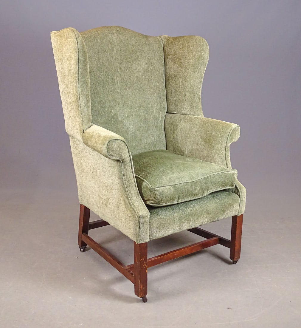 19th c. Wing Chair: 19th c. wing chair. Legs raised on casters. 18" seat Ht., 44" overall Ht..
