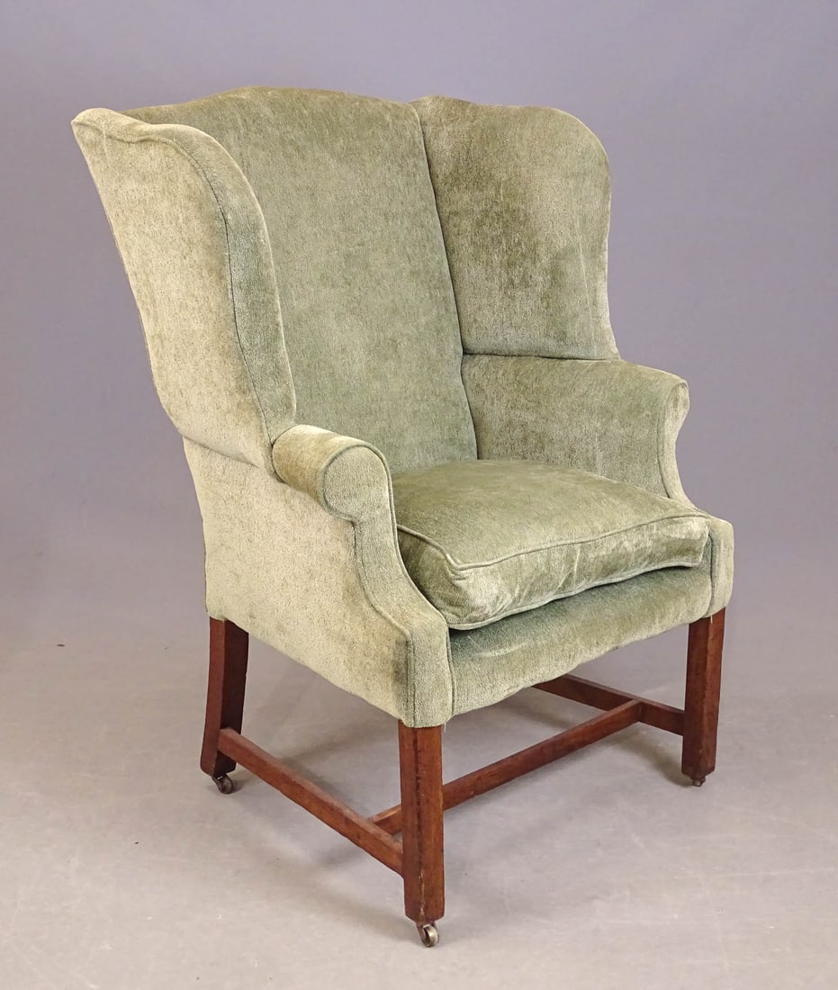 19th c. Wing Chair: 19th c. wing chair. Legs raised on casters. 18" seat Ht., 44" overall Ht..