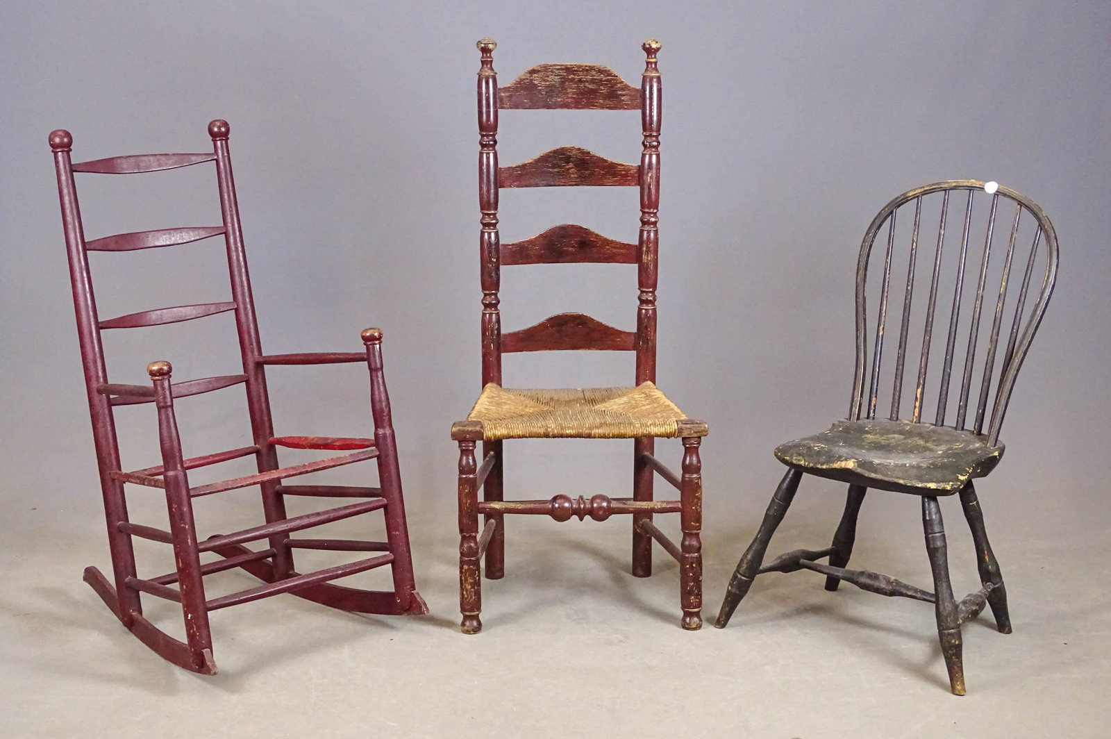 Early Chair Lot: Lot (3) early chairs including: Rocking chair (no seat, 14" seat Ht., 39" overall Ht.), Windsor (16" seat Ht., 34" overall Ht.), ladderback (17" seat Ht., 45" overall Ht.).