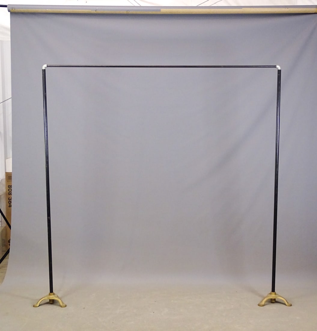 Iron Racks: Lot (2) iron racks with cross pole for display. 74 1/2" Ht., cross pole 74" L..