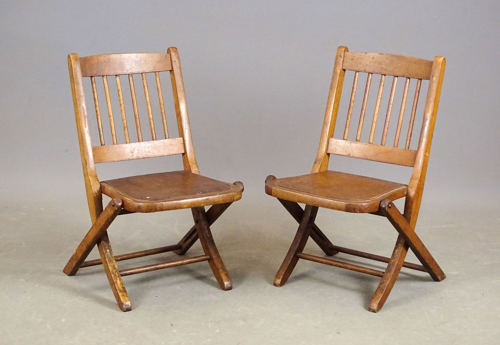 Pair Vintage Child's Folding Chairs: Pair vintage child's folding chairs. 24" Ht..