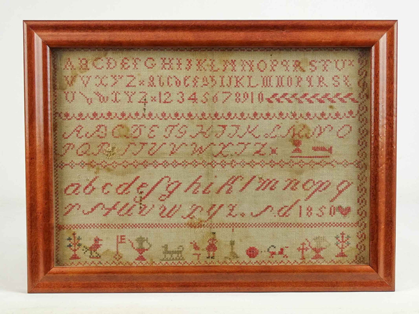 Antique Needlework Sampler: Antique needlework sampler.
