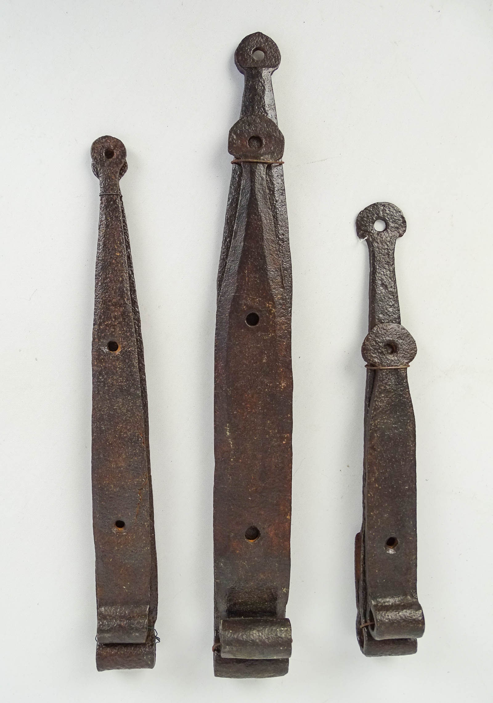 Early Hinges: Lot (6) early iron hinges. (2) 13 1/4", 12", 8", 13", 16".