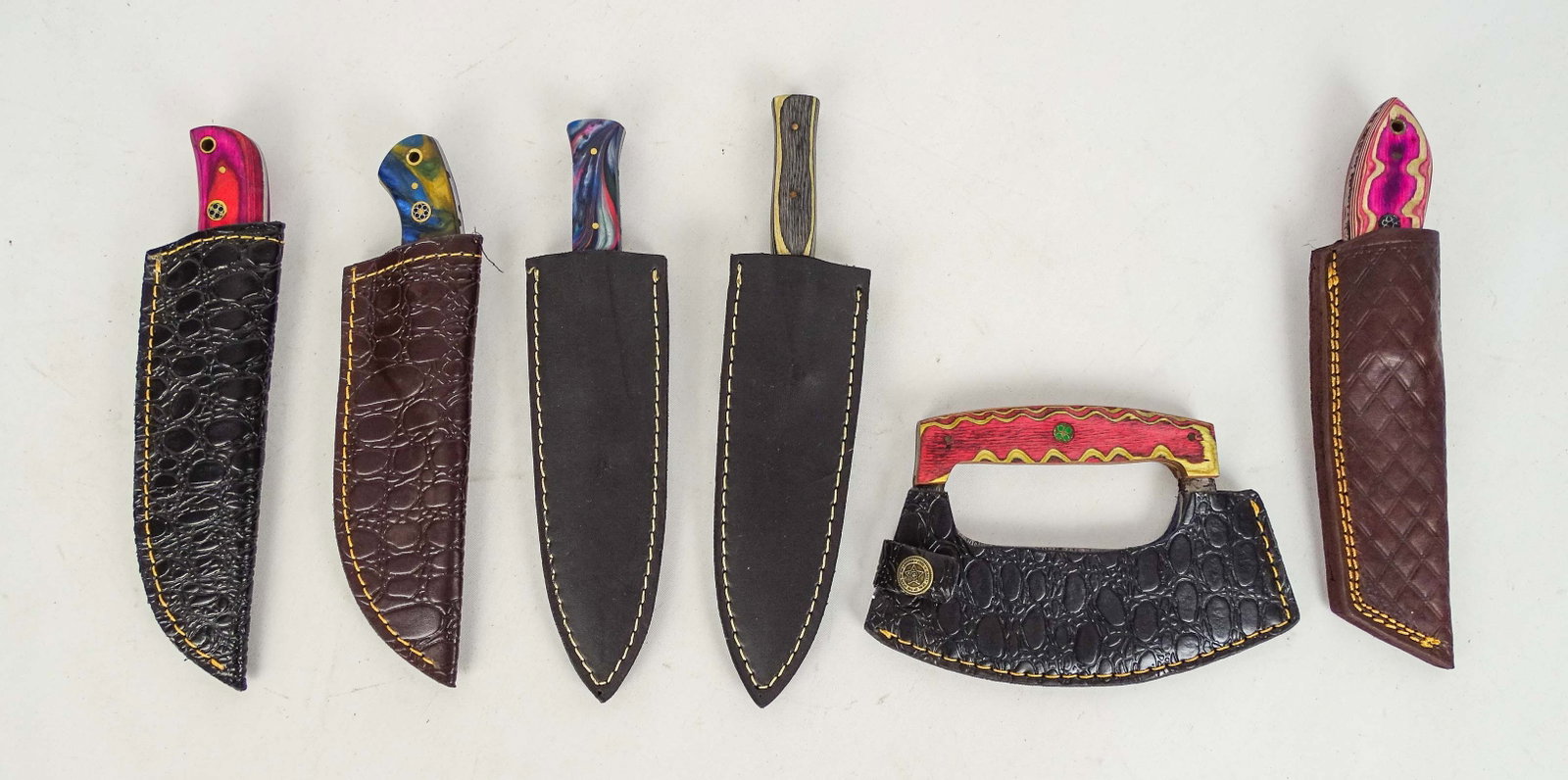 Lot of Handmade Knives: Lot of (6) handmade knives with sheaths. Longest 9" L..