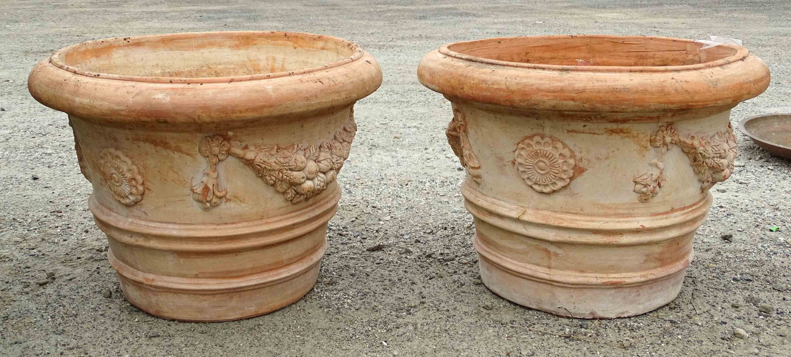 Pair Terracotta Planters: Pair of terracotta planters. 19" D., 14" Ht..