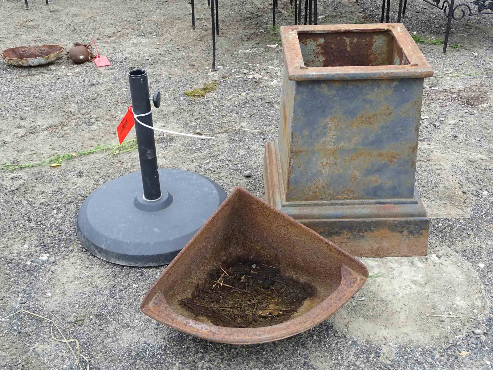Misc. Lot: Misc. lot including urn base, trough, umbrella rack.