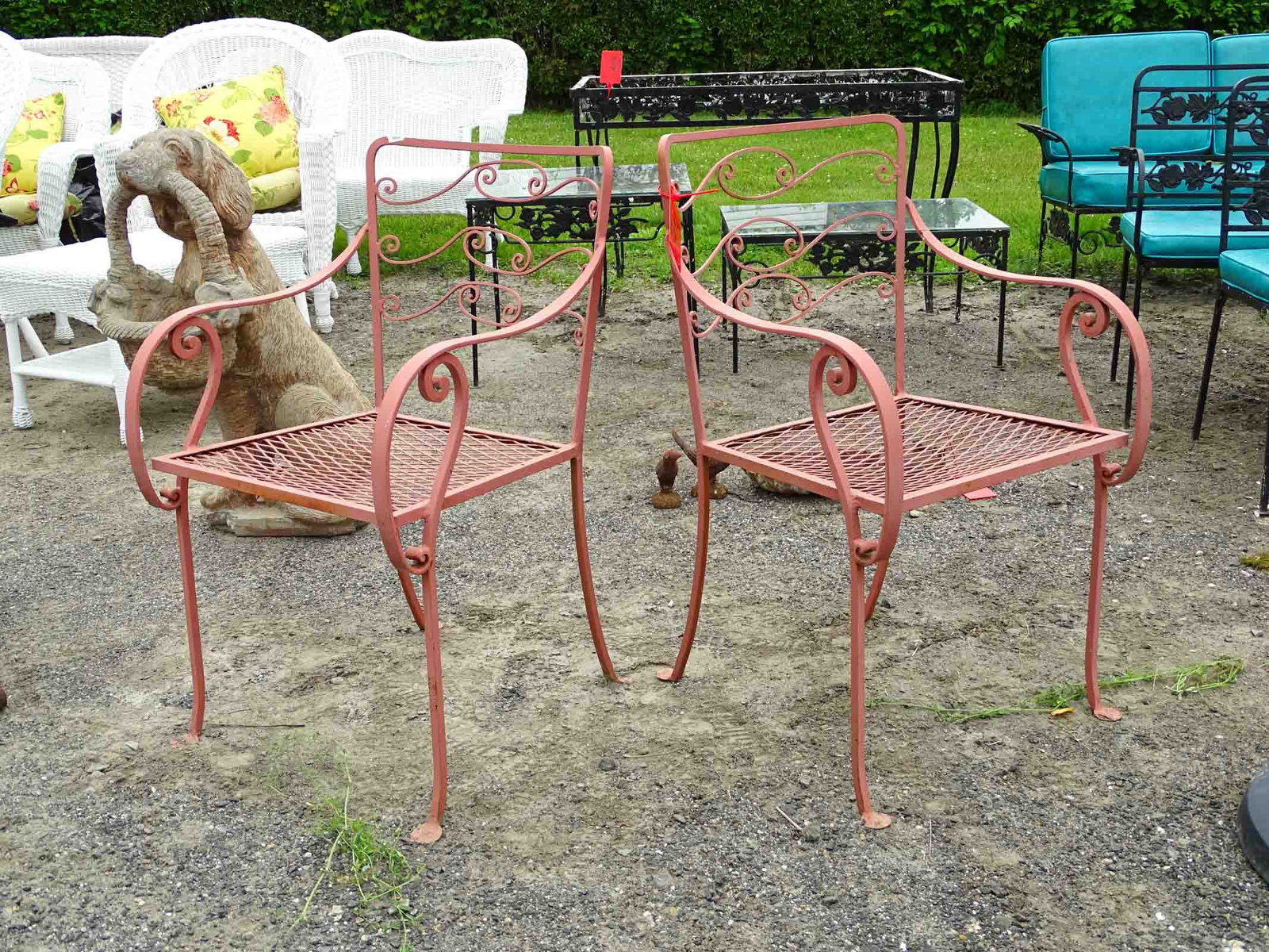 Pair Wrought Iron Chairs: Pair of wrought iron chairs.