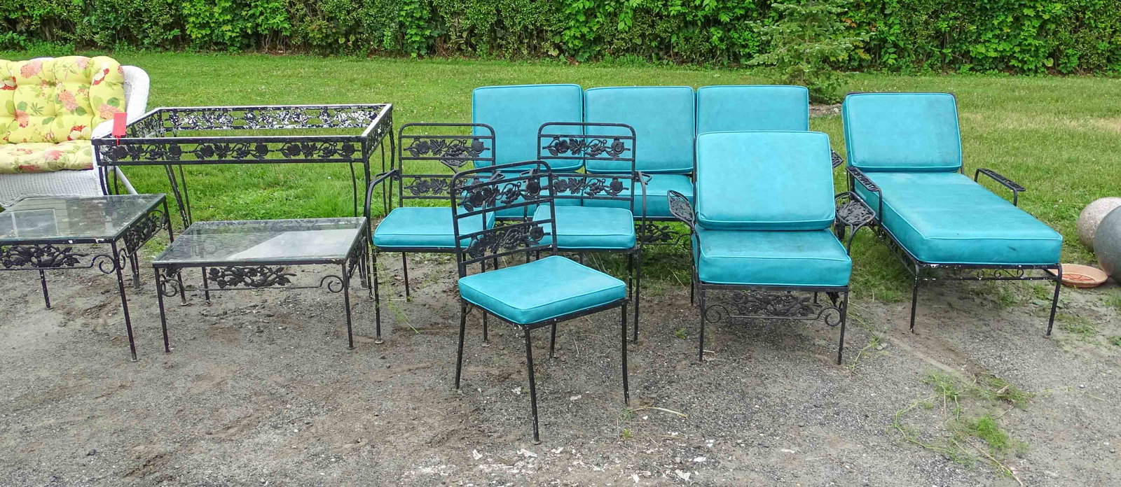 Wrought Iron Patio Set: Wrought iron patio set including: Table (no glass), (4) chairs, (2) glass top tabvles, settee, chairs. With various cushions.
