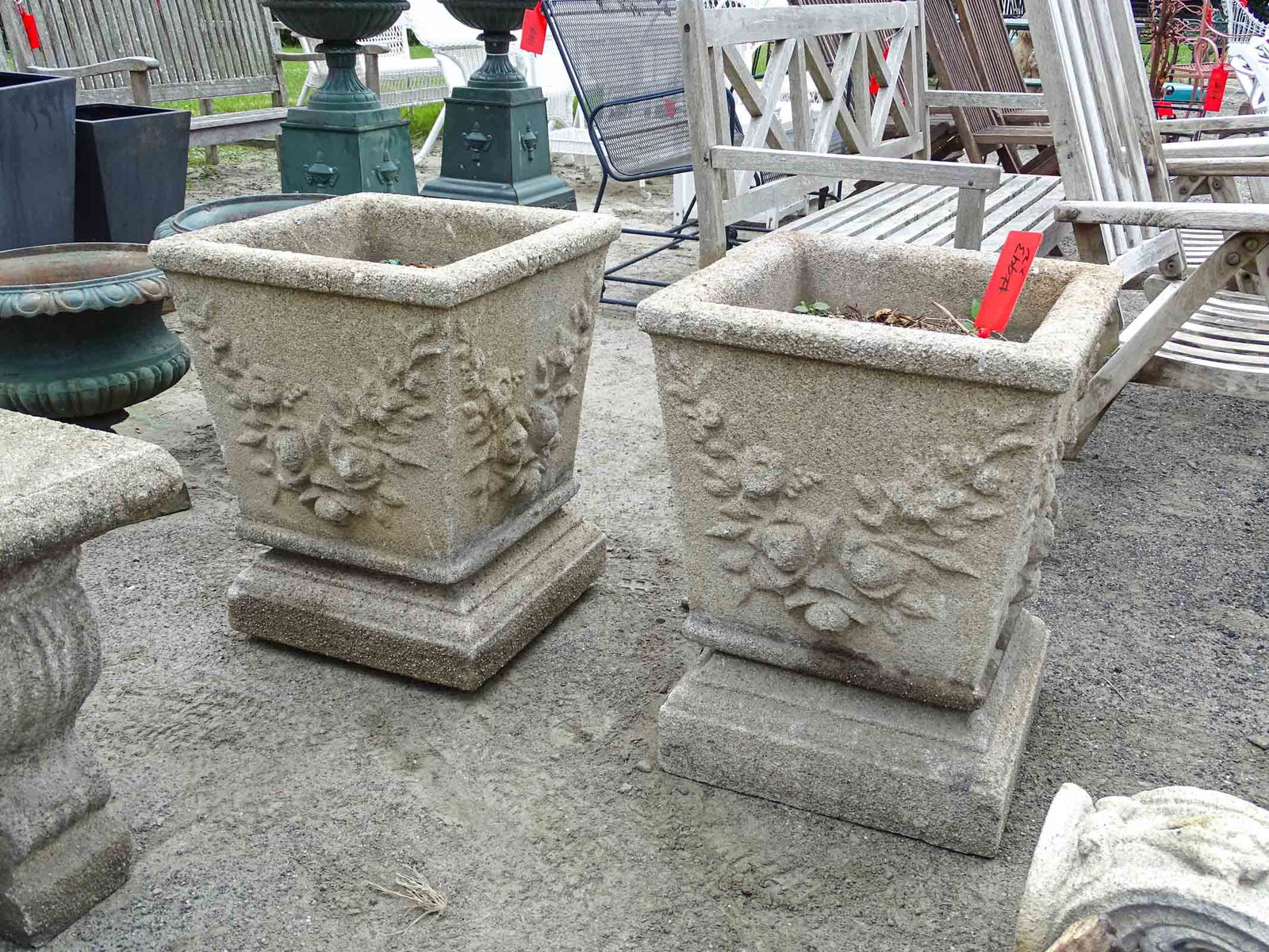 Pair Poured Stone Urns: Pair of poured stone urns. 18" x 18" x 24" Ht..