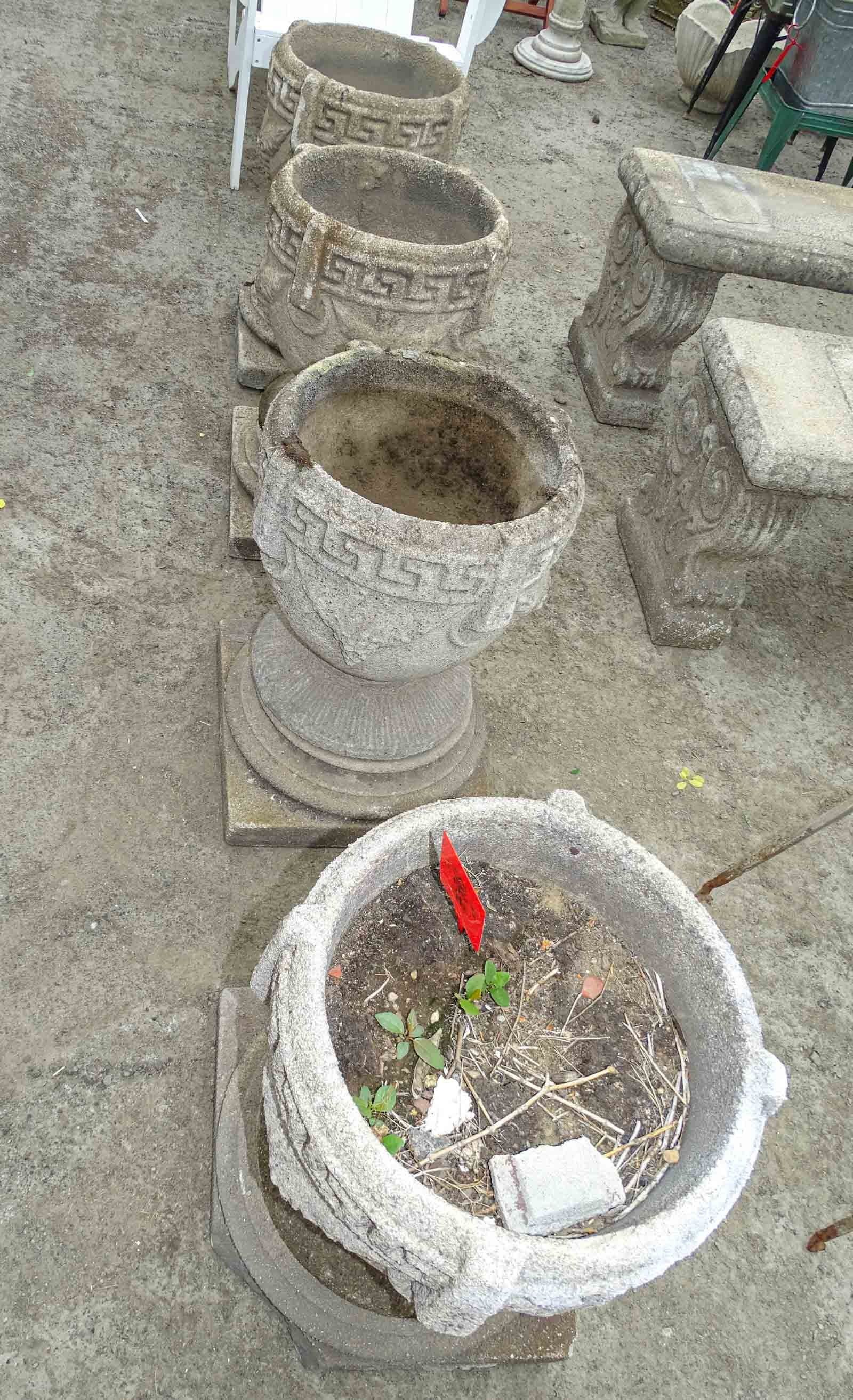 Set (4) Poured Stone Urns: Set of (4) poured stone urns. 14" D., 24" Ht..