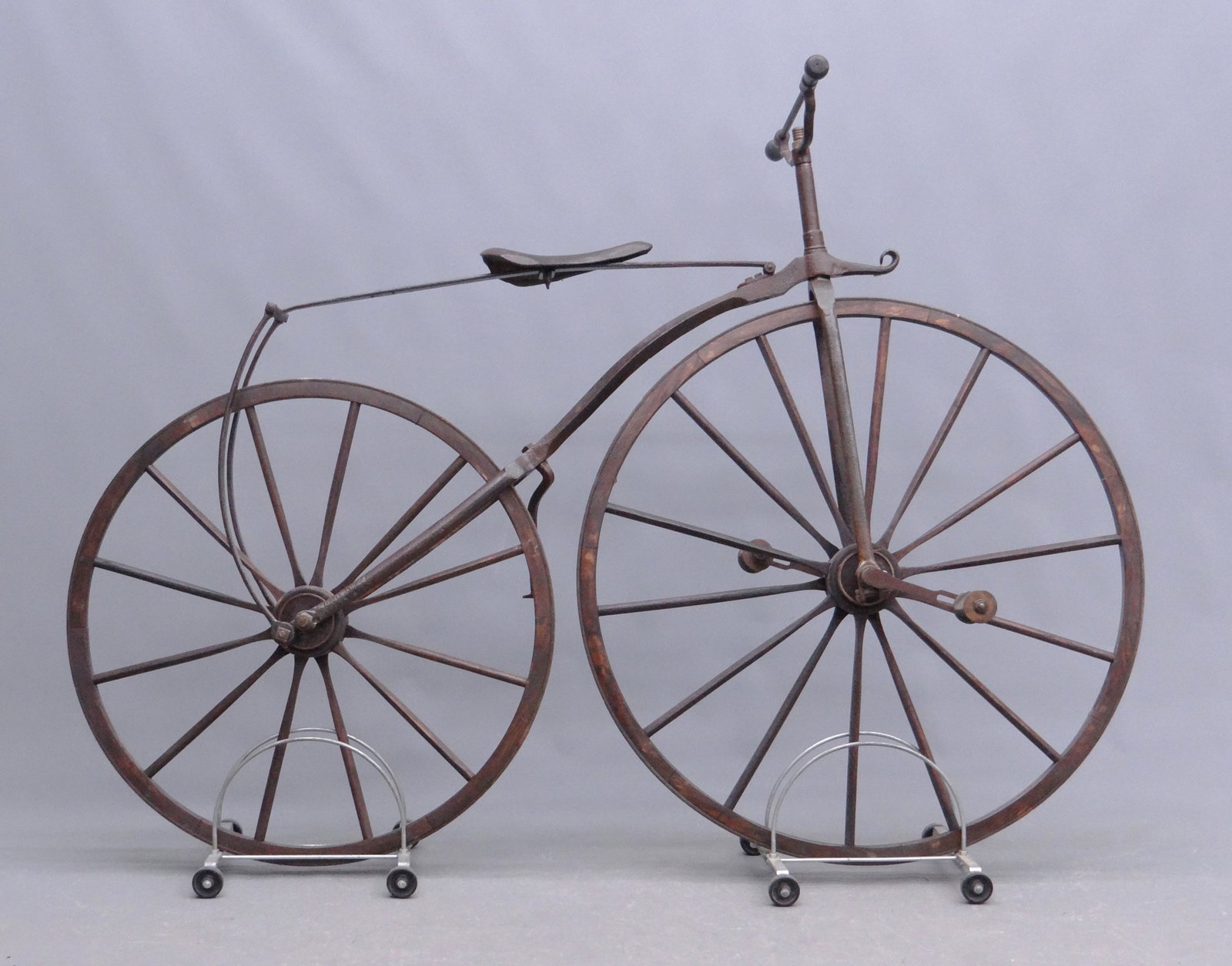 Labeled 19th c. Boneshaker: C. 1869 Boneshaker labeled Paul Hood & Co. King William St. London. 37" front, 32" rear wheels. Sold by Copake Auction, April 13, 1996 (lot 20). Good condition. Previously sold at Copake Auction