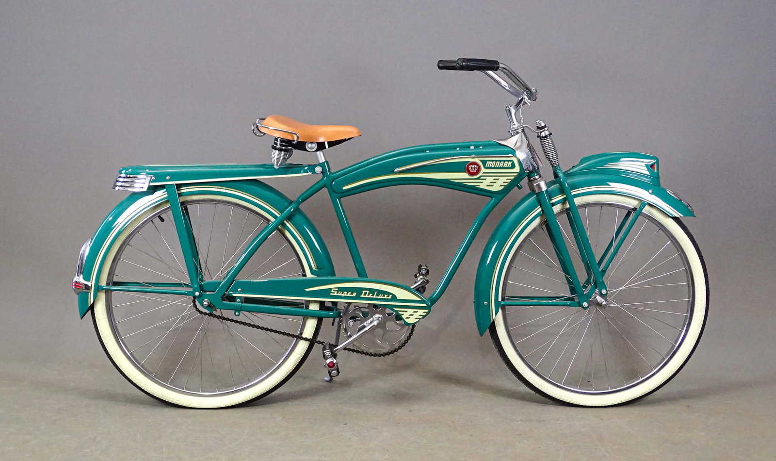 Monark Balloon Tire Bicycle: Monark balloon tire bicycle "Super Deluxe". 19" frame. Spring front. Lobdell Emery saddle. White wall tires. Nice restoration.