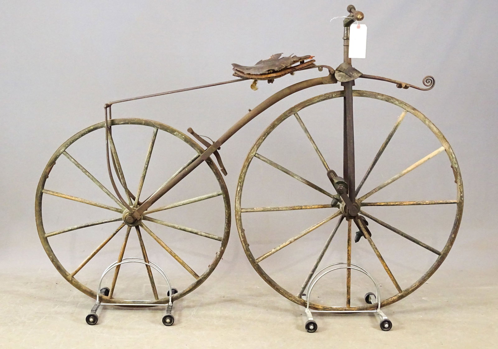 19th c. Boneshaker: 19th c. blacksmith made Boneshaker. Has scarce leather collar (marked Boston). 37" front wheel, 31" rear wheel. Barn find condition.