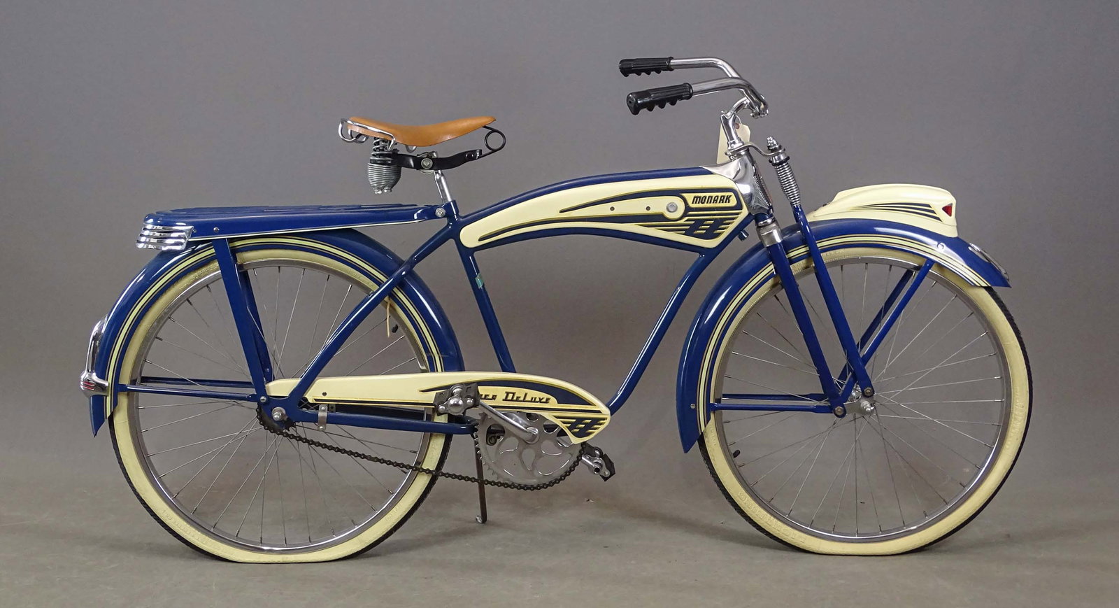 Monark Super Deluxe Bicycle: Monark Super Deluxe bicycle. Nice restored condition. 19" frame. Front light, rear rack, springer front end.