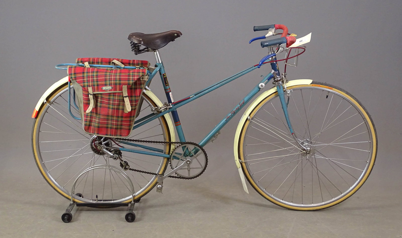 Queen of Scotts Bicycle: Women's "Queen of Scotts" Mixte sport touring bicycle. Beautiful lug work and equipment. A compliment to the men's Flying Scott. Includes original tartan panniers. Bicycle is 1957. Nice original paint