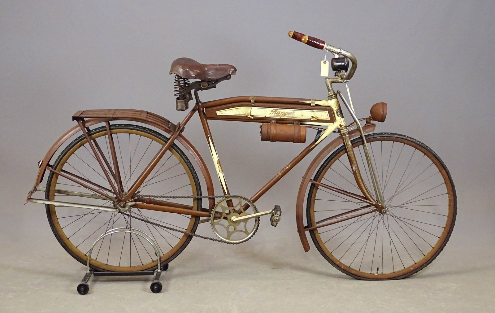Mead Ranger Tank Bicycle: Mead Ranger tank bicycle. C. 1930s with 20" frame, 27" wheels and balloon tires to fit, new departure coaster brake, tank in frame, metal fenders, headlight on front fender, battery canister, klaxon