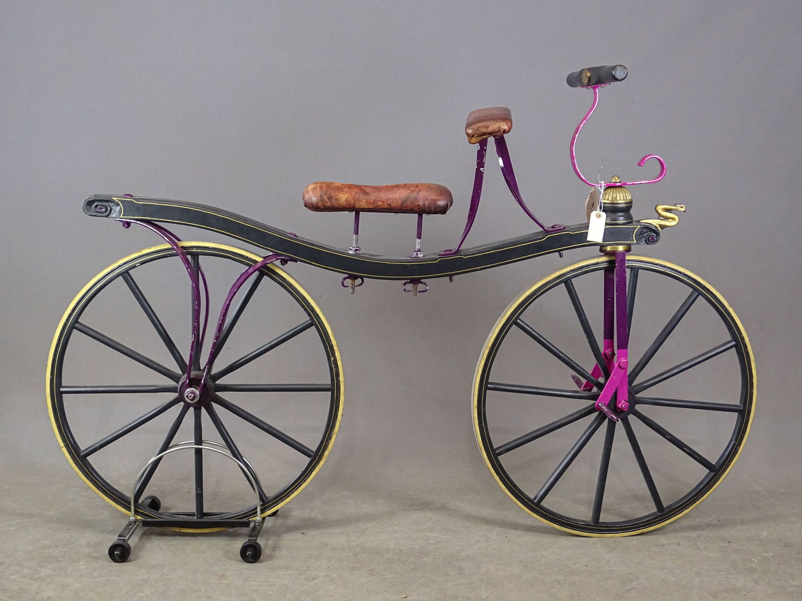 Johnson Hobby Horse Replica: Johnson hobby horse: a replica of an 1819 hobby horse made by Mr. Johnson in London, England. This machine is a slight modification of the Draisine (the world's first bicycle) invented by Baron Karl
