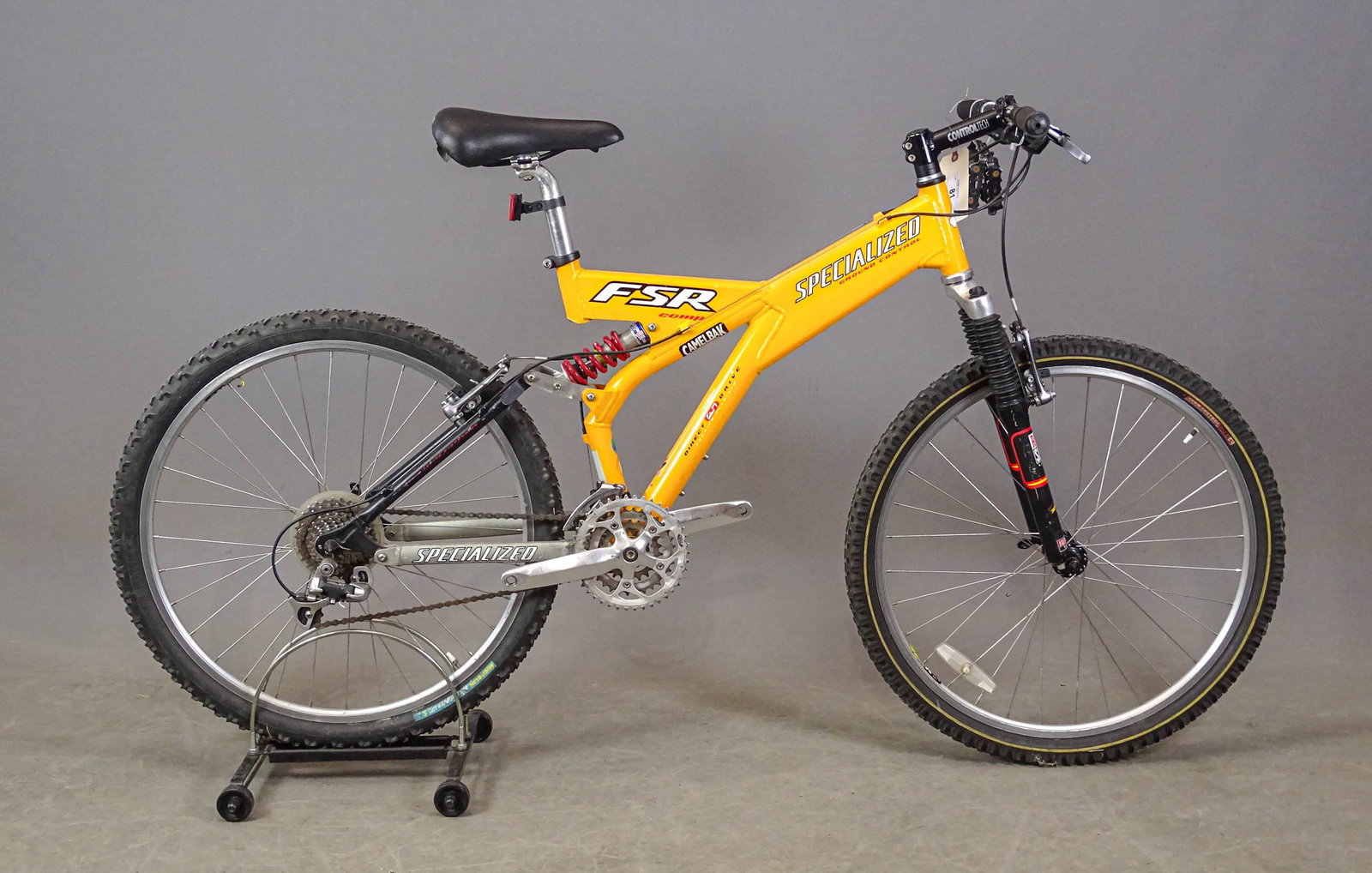 Specialized Mountain Bicycle: Specialized FSR Comp. Ground Control full suspension mountain bicycle. Size medium, SN#PH784810. Rockshox Judy fork, XT derailleur , LX components. C. 1997. Good condition.