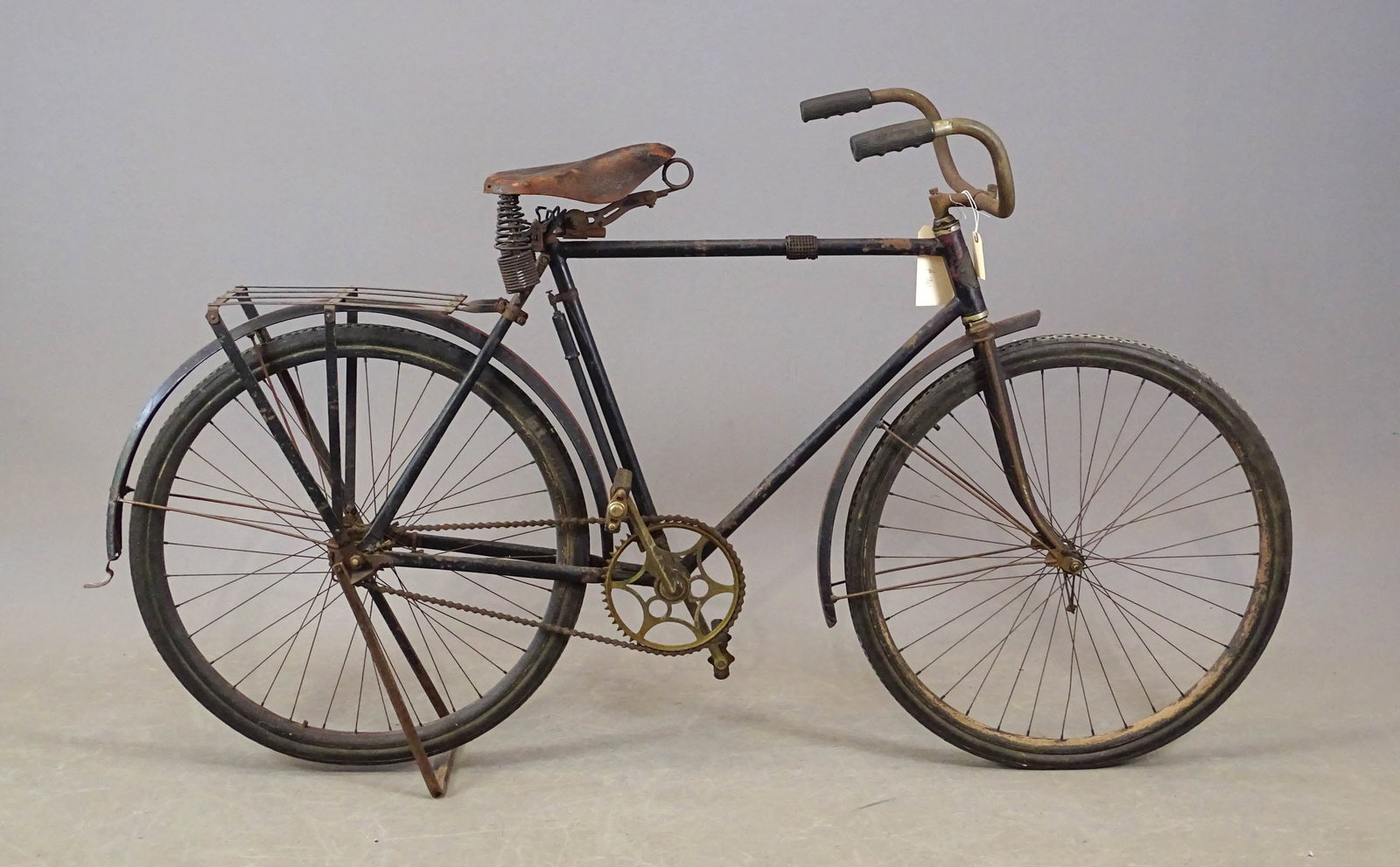 Mead Ranger Bicycle: Mead Ranger bicycle with metal fenders and a luggage rack over the rear wheel. This bicycle has its original seat and handlebar grips. Gary Sanderson Collection.