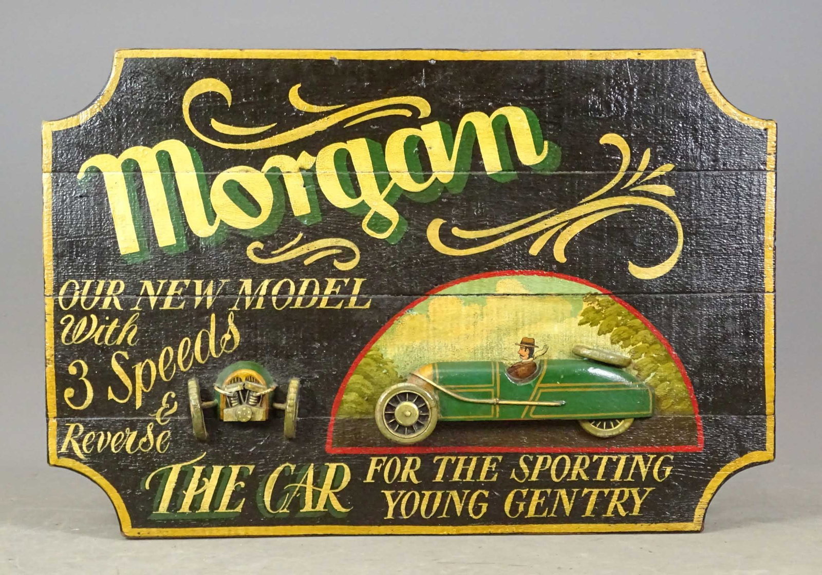 Sign: Painted wooden sign "MORGAN OUR NEW MODEL....". 24" x 36 1/2". Good condition.