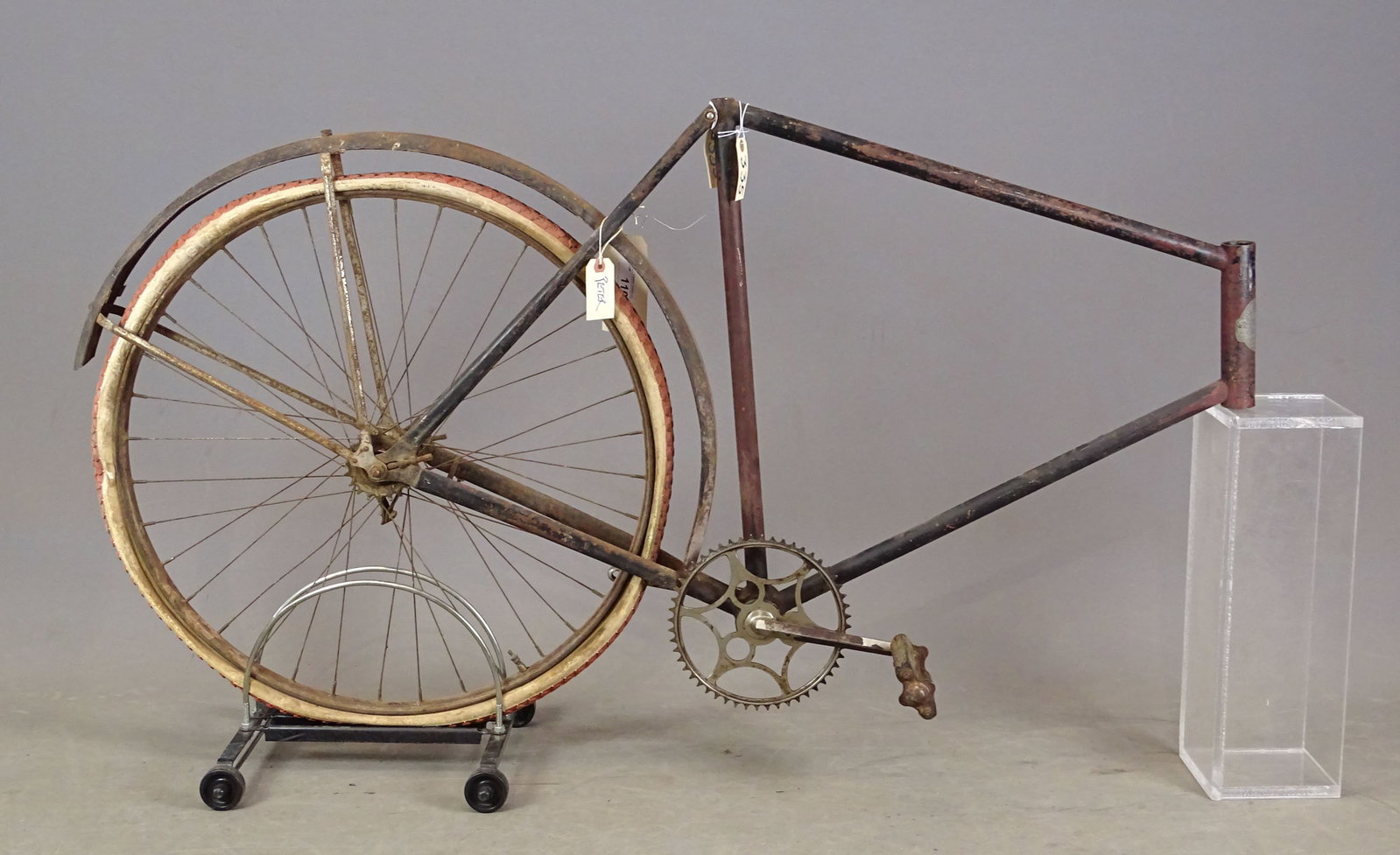 Mead Ranger Project Bicycle: Mead Ranger project bicycle. The rear wheel is laced with a metal rim and a new departure coaster brake, model "A". This bicycle has a bottom bracket with crank arms complete except it has only one