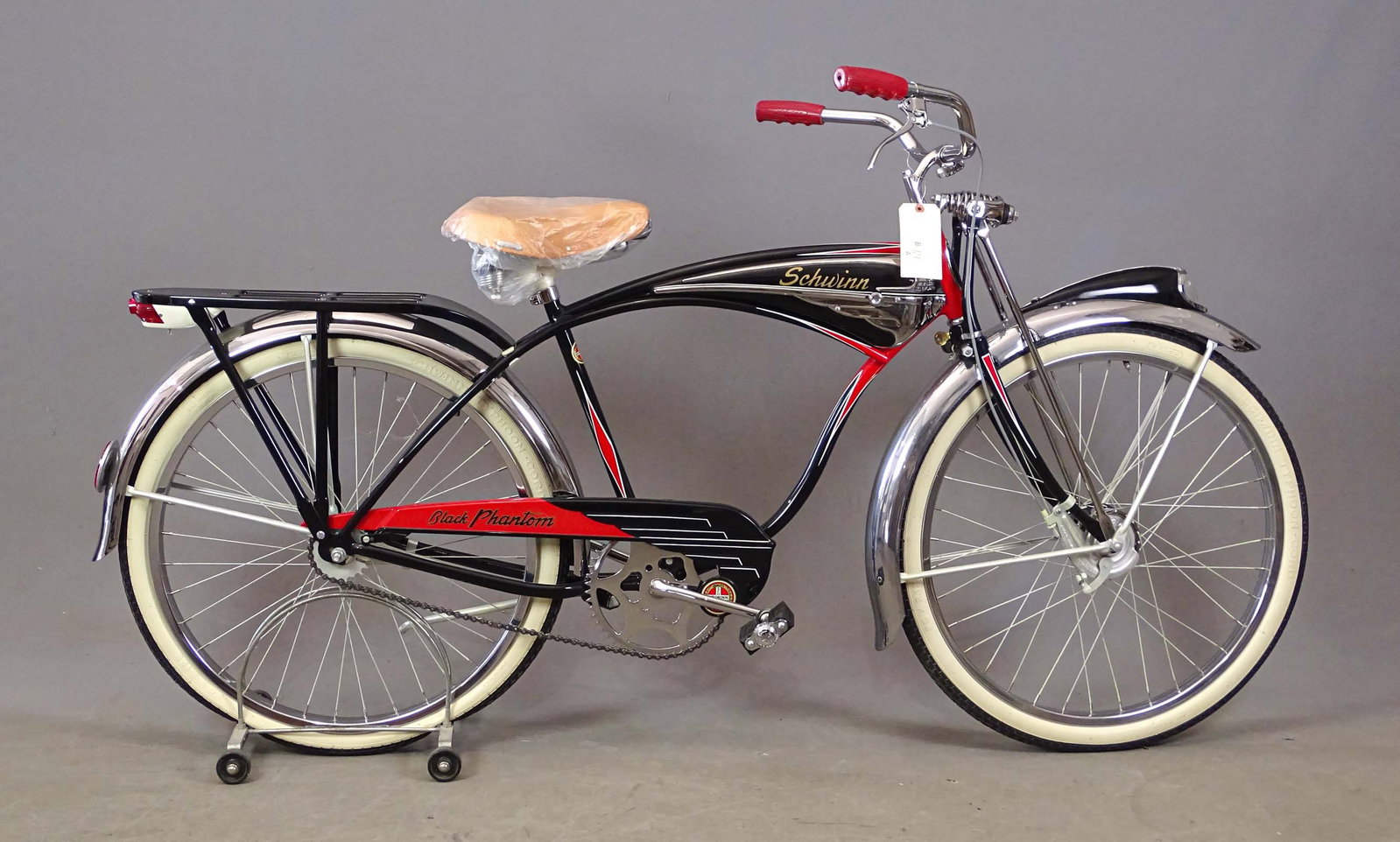 C. 1950's Schwinn Phantom Bicycle: C. 1950's Schwinn Phantom 26" balloon tire bicycle. 18" frame. Restored. Schwinn Typhoon Cord whitewall tires.